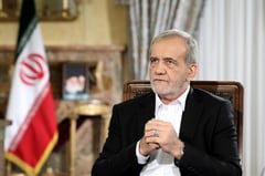 Iran president heads to Iraq on first foreign visit